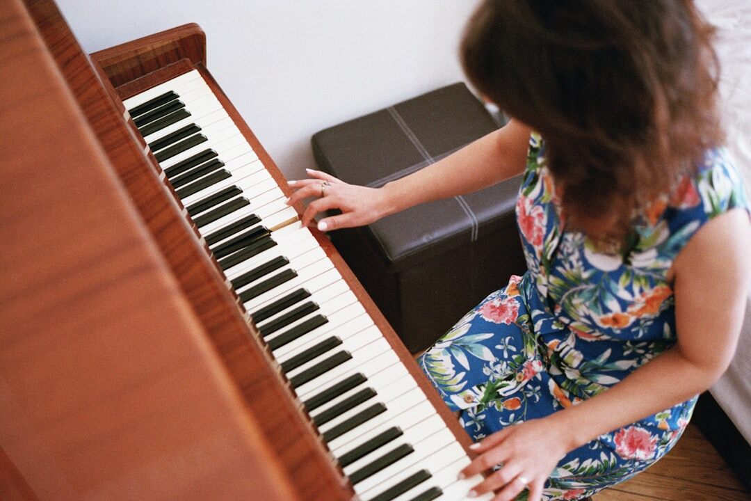 female tv host at piano